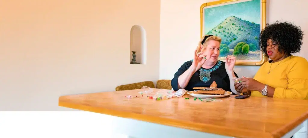 Hero-Banner_Podder-GoldiePerkins_Buidling-Gingerbread-House_Group_2000x896-f5137d99-1920w Hero Banner Podder GoldiePerkins Buidling Gingerbread House Group 2000x896 f5137d99 1920w