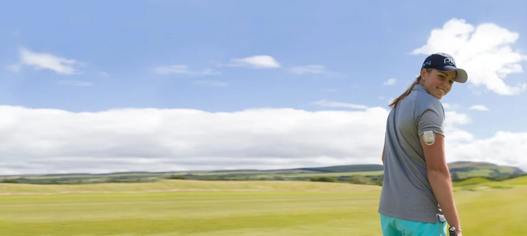 Hero-Banner_Podder-HannahMcCook_Outdoor-in-golf-attire_Single_2000x896-1920w