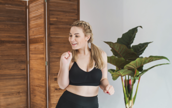 Woman about to workout smiling because she has Guardian CGM in Columbus, OH