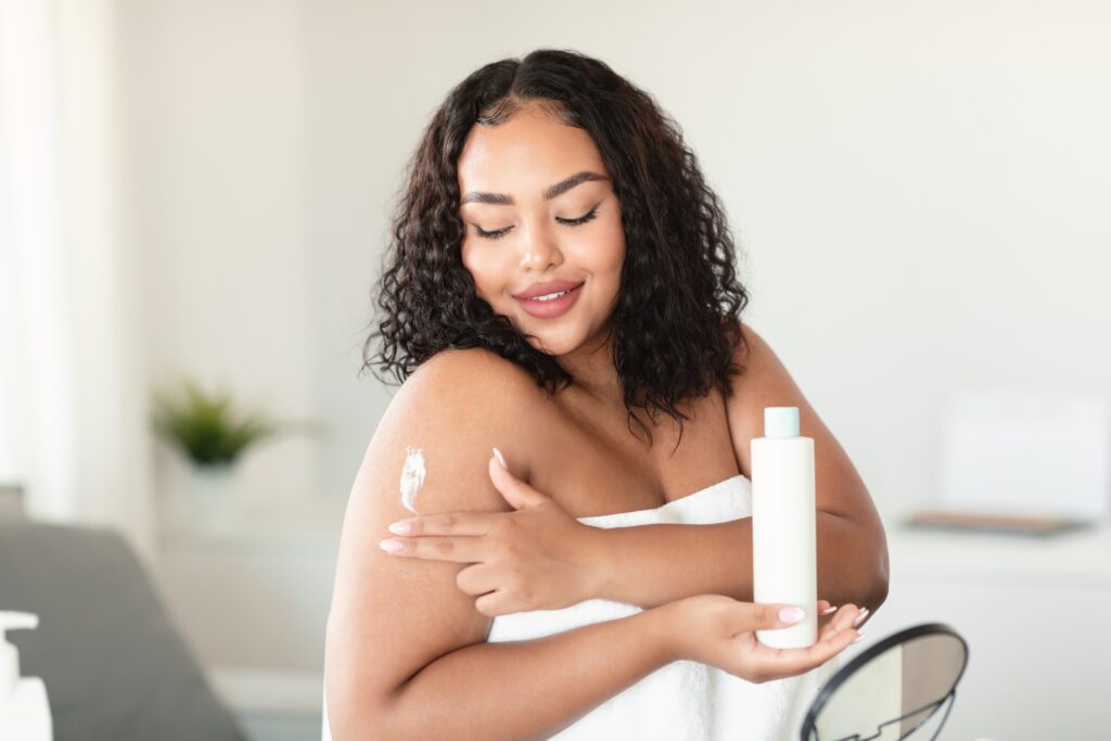 Woman applying moisturizer for diabetes device skincare in Columbus OH